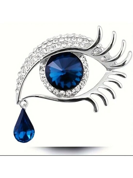 Jewelry - Silvertone Blue Eye Brooch